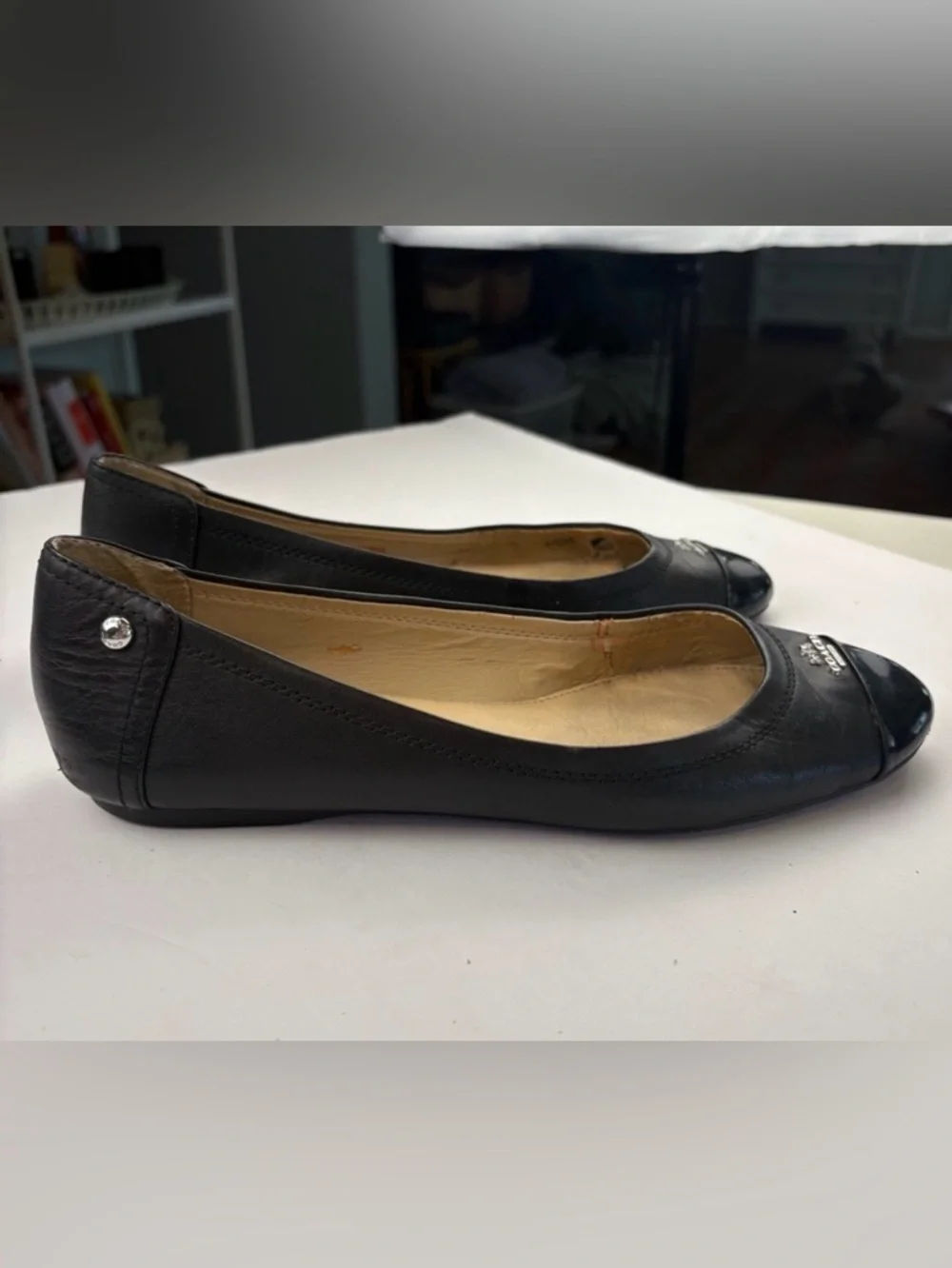Coach Black Leather Women's Flats with Silver Accents